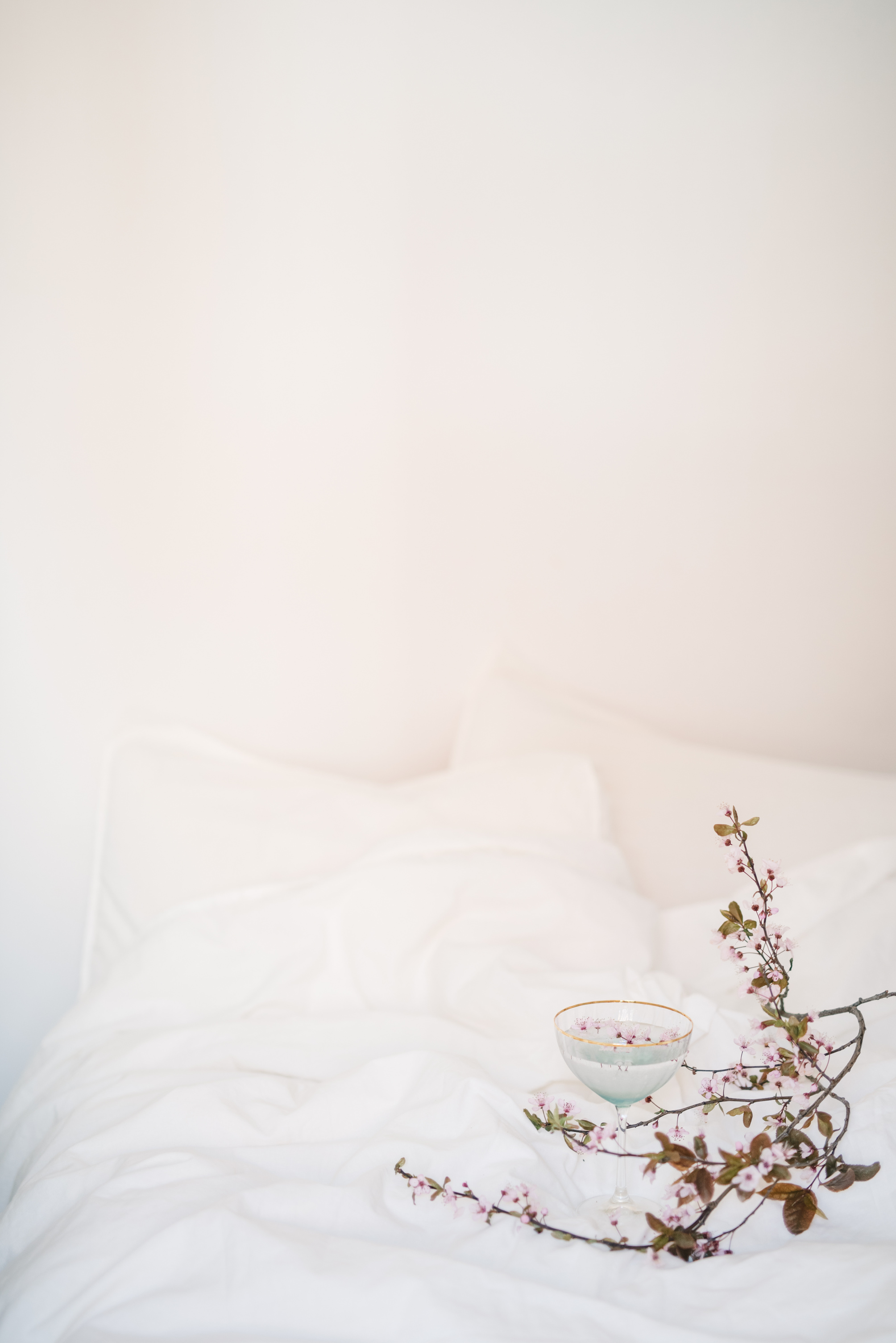 White Ceramic Teacup on White Textile
